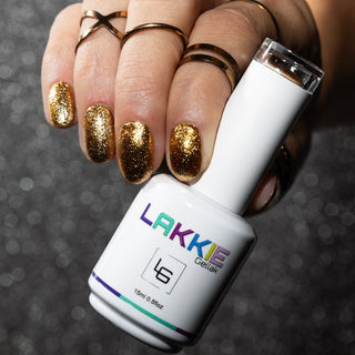 LAKKIE Extra Gold is een gouden kleur glitter gellak. Deze glitter gellak is extreem goed dekkend, en heeft maar 1 a 2 laagjes nodig.   Extra Gold is een perfecte gellak om te dragen tijdens de feestdagen. Doordat deze gellak zo dekkend is kun je Extra Gold ook perfect gebruiken tijdens het maken van jouw nailart creaties.