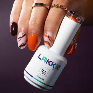Oranje nailart swirls_herfst trends en nagel inspiratie